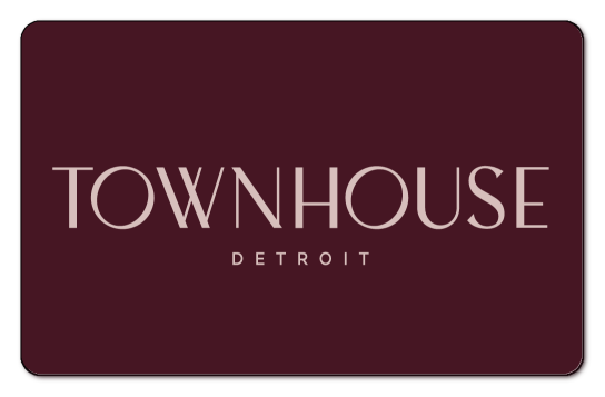 Townhouse logo over a maroon background